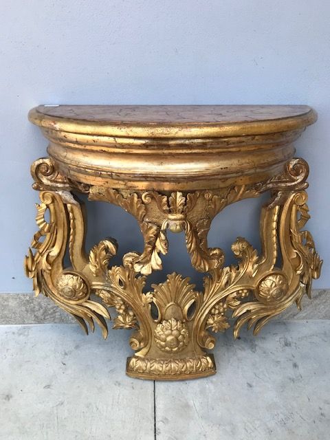 Carved and gilded wood console table