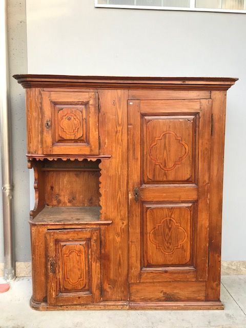Rustic cabinet in Val di Susa Larch with one door and two doors.