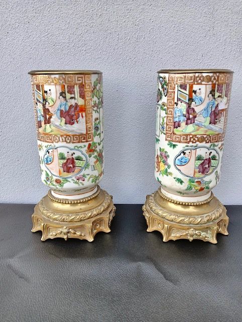 Pair of Chinese Porcelain Vases with Bronze Base.