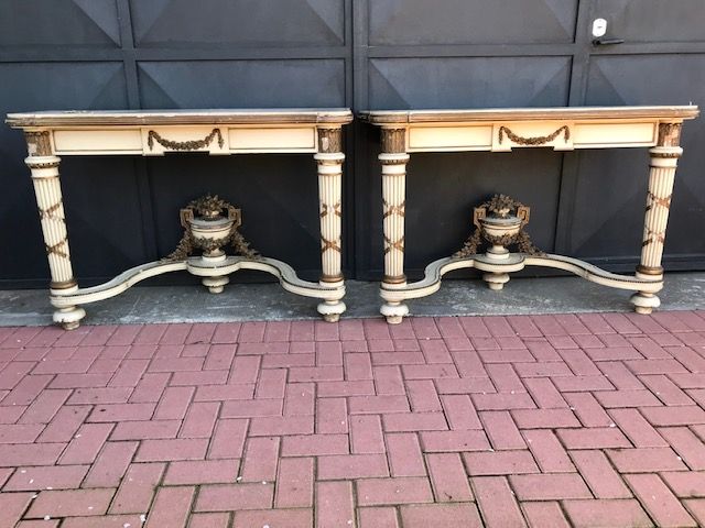 Pair of Louis XVI console tables in painted and gilded carved wood, with fluted uprights and marble top.
Of Piedmontese provenance.