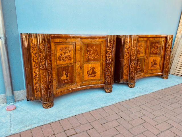 Pair of Important Moved Sideboards, veneered in Rosewood Cherry and Walnut.
They feature boxwood and ebony inlays.