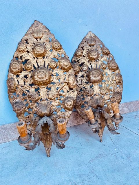 Pair of Embossed and Gilded Metal Wall Lights.