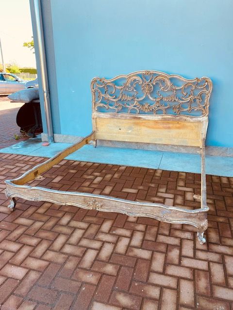 Carved and Silver-plated Wooden Bed.