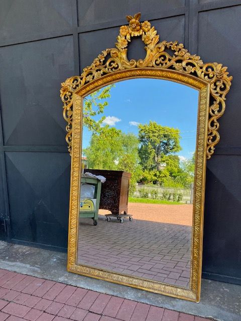 Charles X Mirror in Carved and Leaf-Gilded Wood.