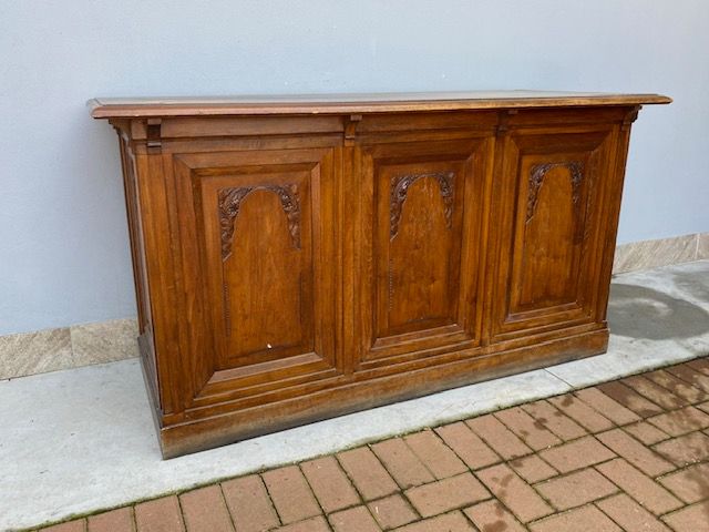 Shop counter in elm wood from a Piedmontese grocery shop.
