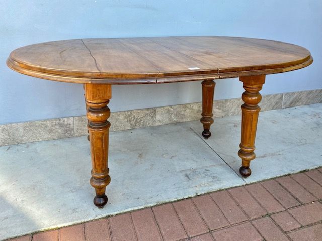 Oval English Extending Mahogany Table, cranked.