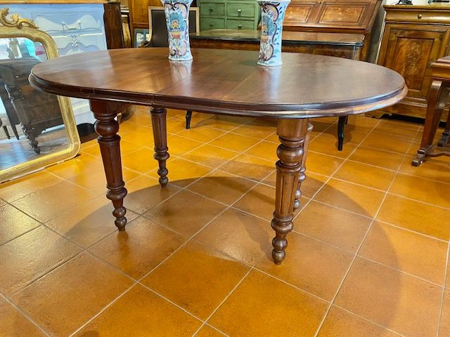 Oval English Extending Mahogany Table, cranked.