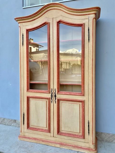 Antique Bookcase Lacquered Cream White, carmine red profiles.