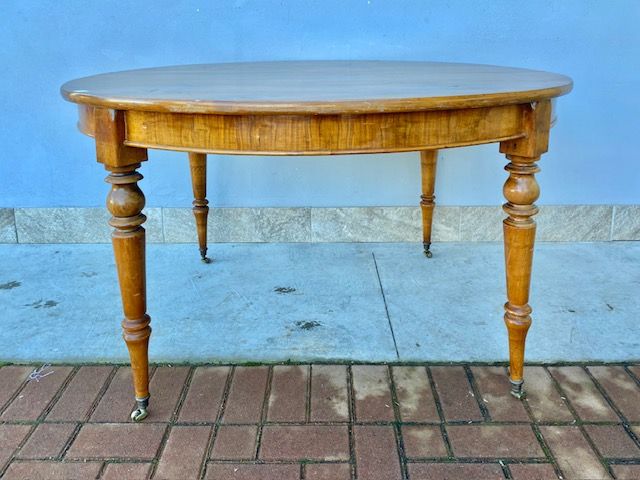 Antique Oval Extending Walnut Table.