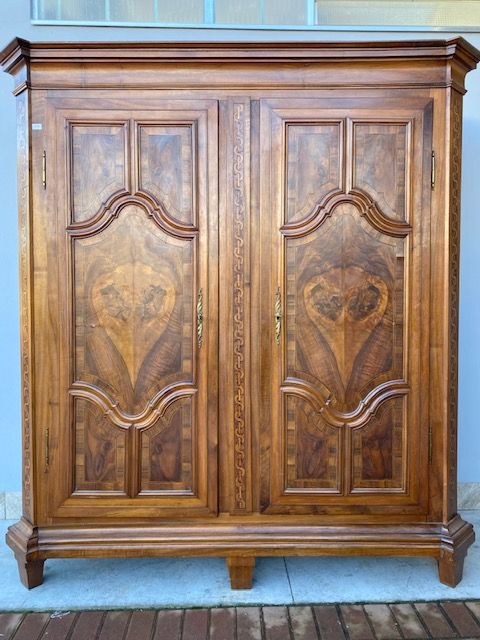 Important Tyrolean Walnut Wardrobe with Inlays in Various Woods.